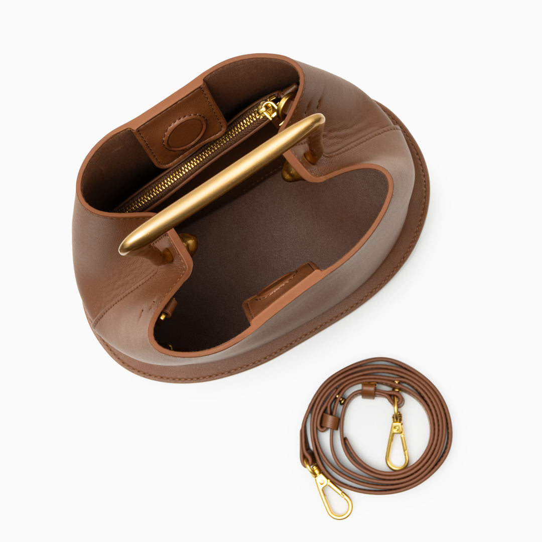 Modern Sculptural Leather Handbag – Minimalist Design with Gold Handle