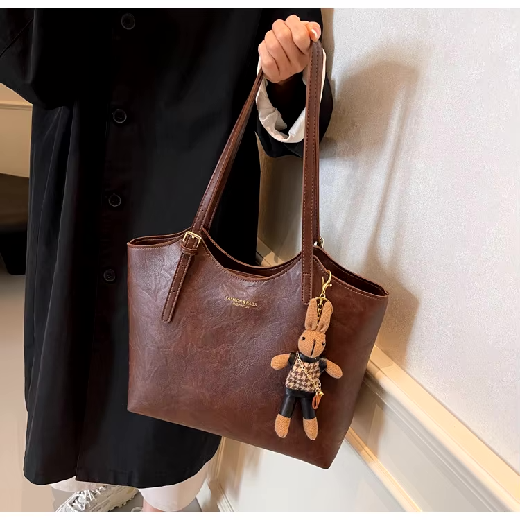 Thalessa | Chic Leather Tote Bag with Playful Charm – Elegance Meets Fun