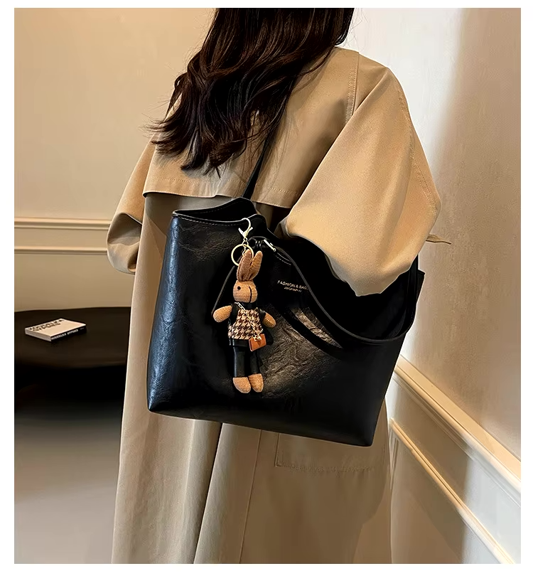 Thalessa | Chic Leather Tote Bag with Playful Charm – Elegance Meets Fun