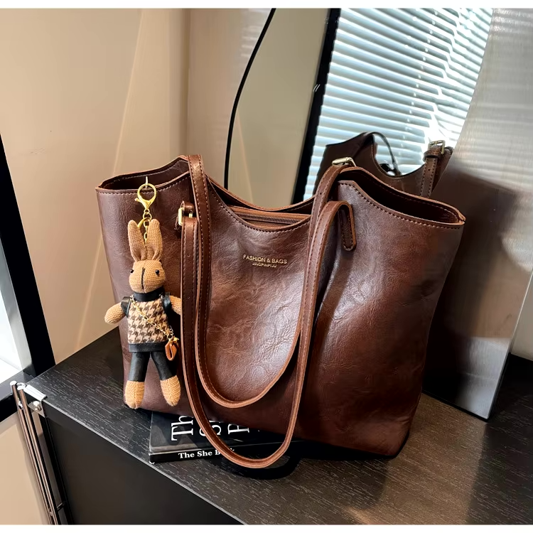 Thalessa | Chic Leather Tote Bag with Playful Charm – Elegance Meets Fun