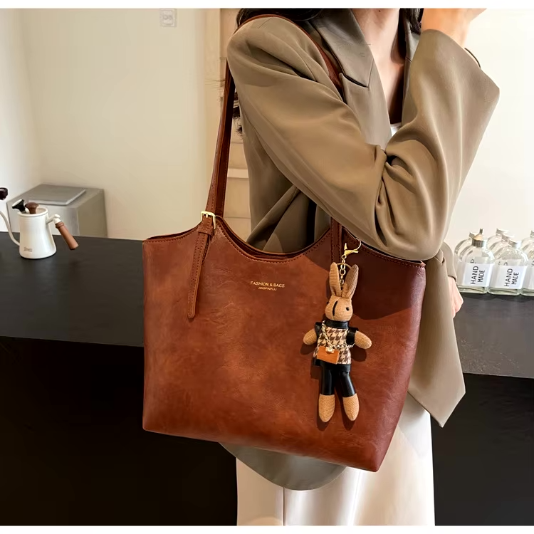 Thalessa | Chic Leather Tote Bag with Playful Charm – Elegance Meets Fun
