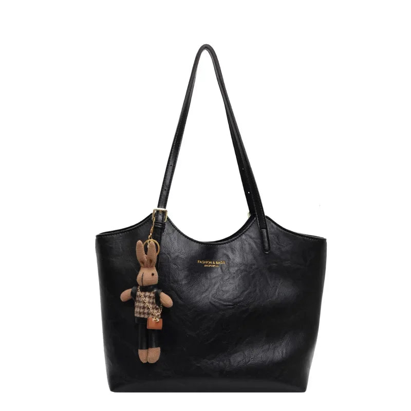 Thalessa | Chic Leather Tote Bag with Playful Charm – Elegance Meets Fun