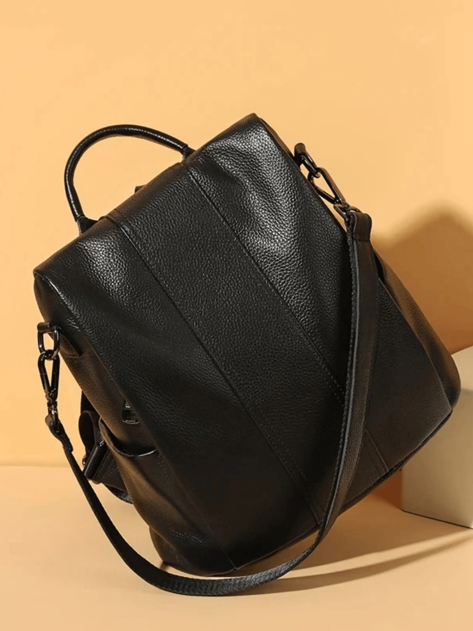 Elthia | Classic Black Convertible Leather Backpack – Timeless & Versatile