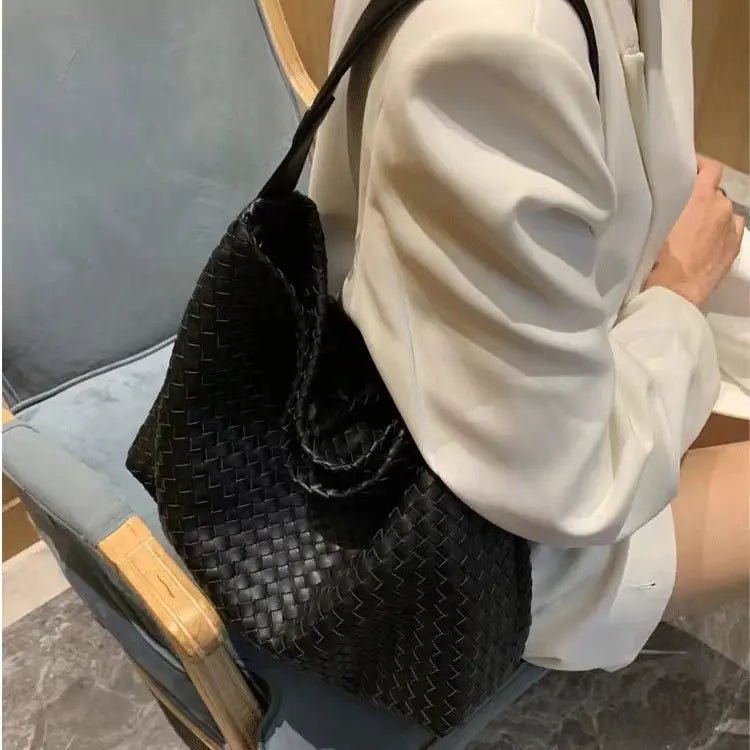 Sorvessa | Black Woven Leather Shoulder Bag – Elegant & Versatile