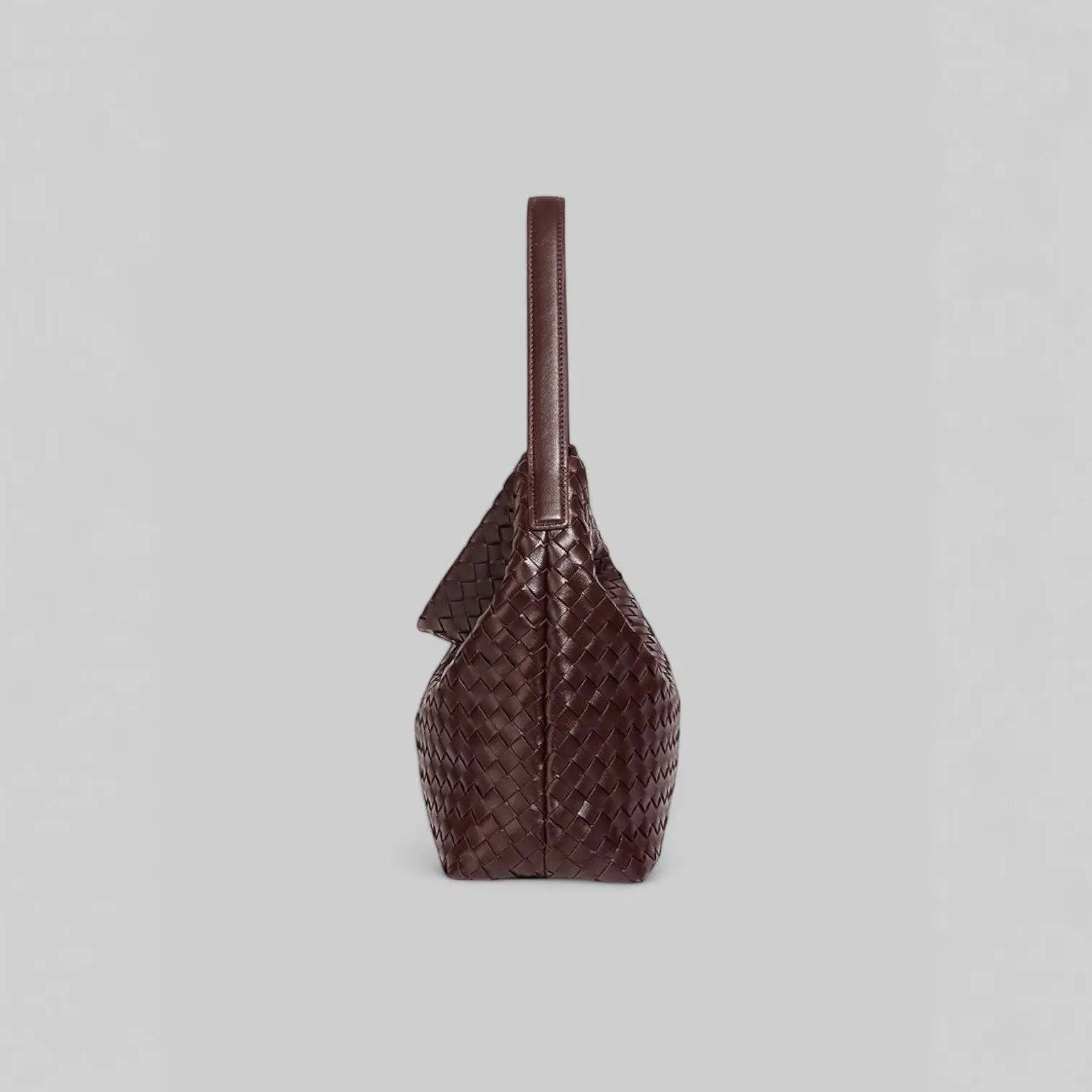 Sorvessa | Black Woven Leather Shoulder Bag – Elegant & Versatile