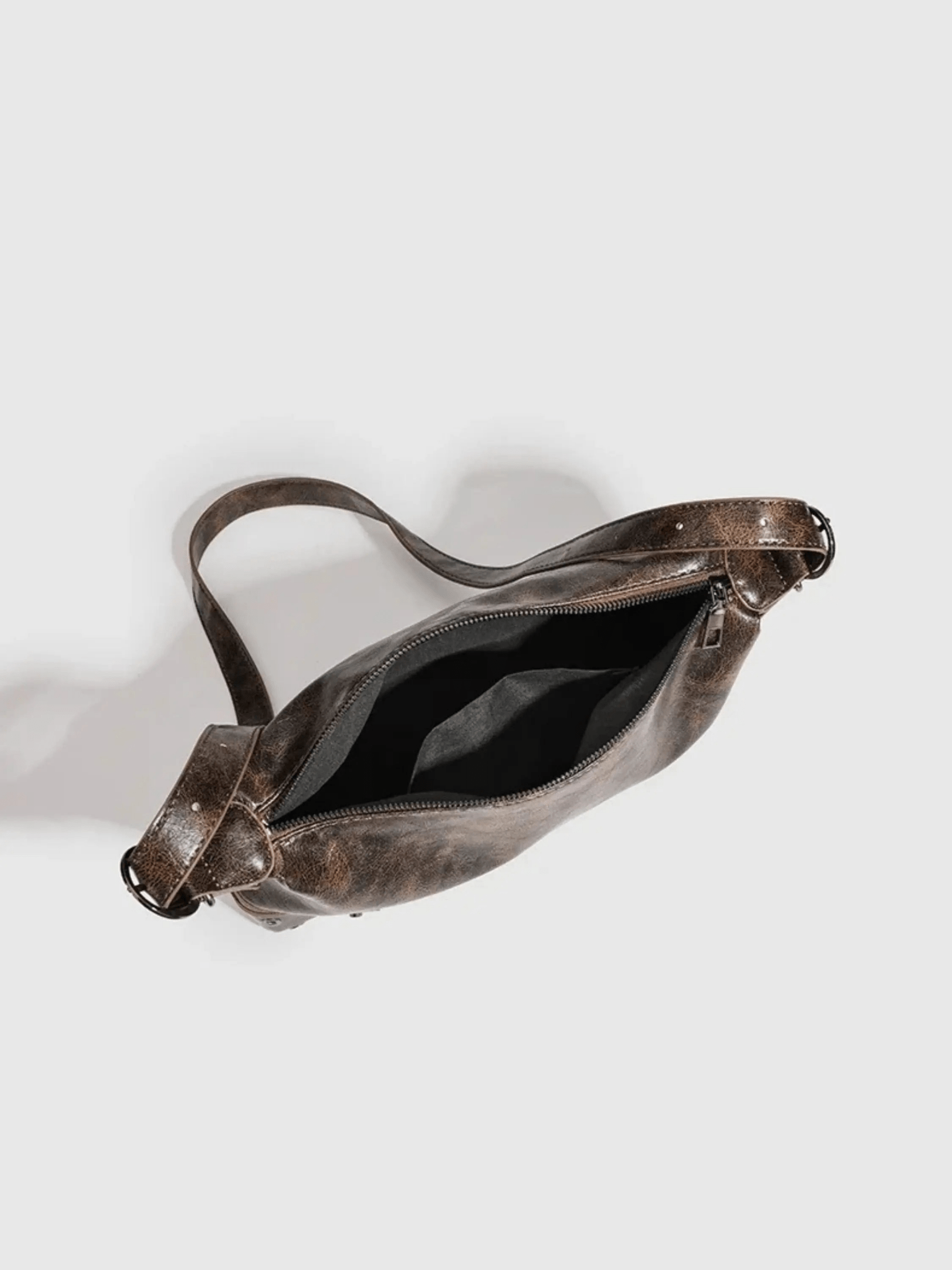Raven | Luxe Distressed Leather Shoulder Bag – Edgy & Bold